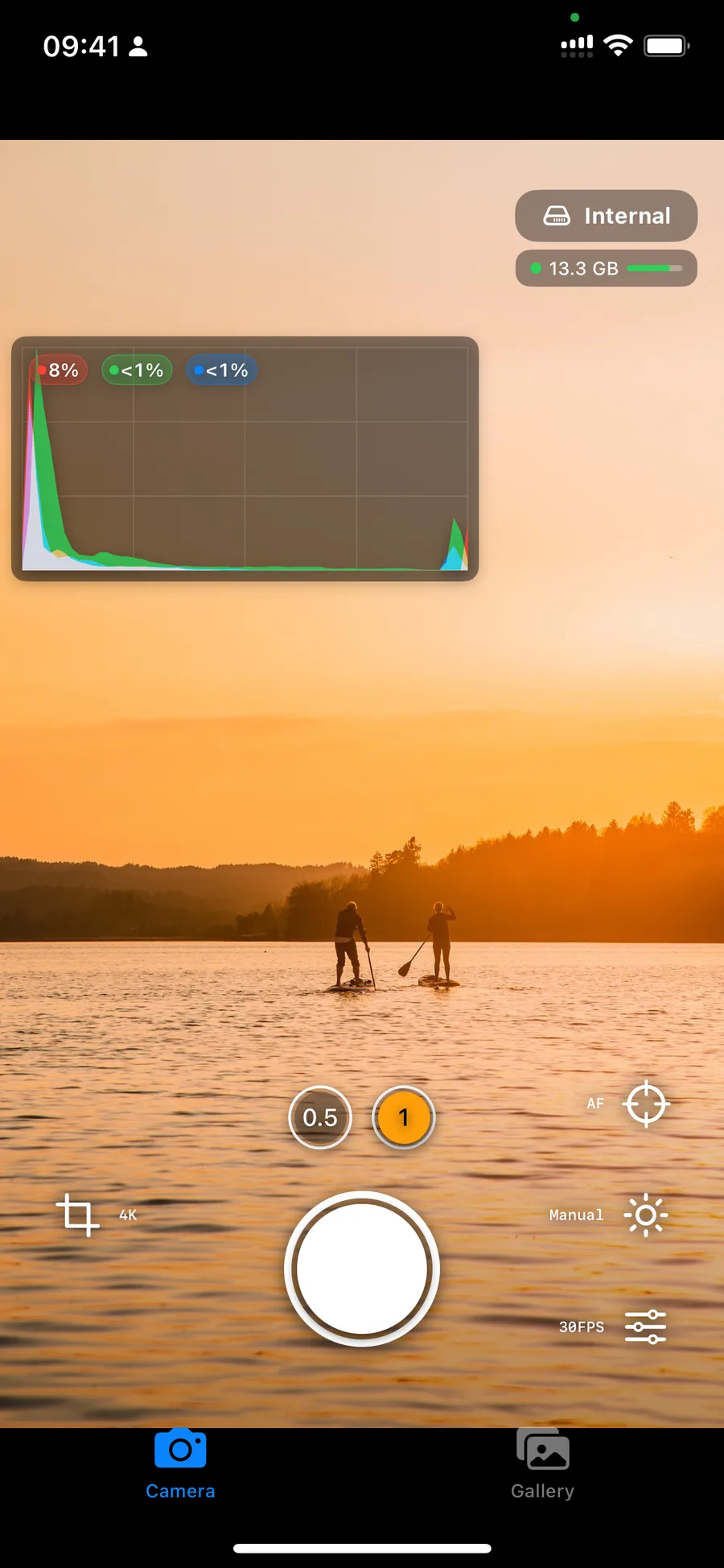 RAW Cam overlay showing histogram and storage indicator during sunset scene